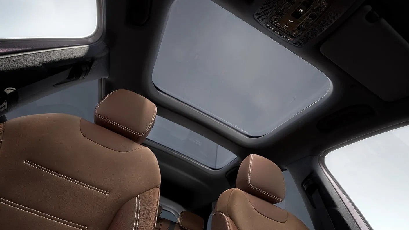 2026 Mercedes-Benz GLB view of a man's arm holding the steering wheel