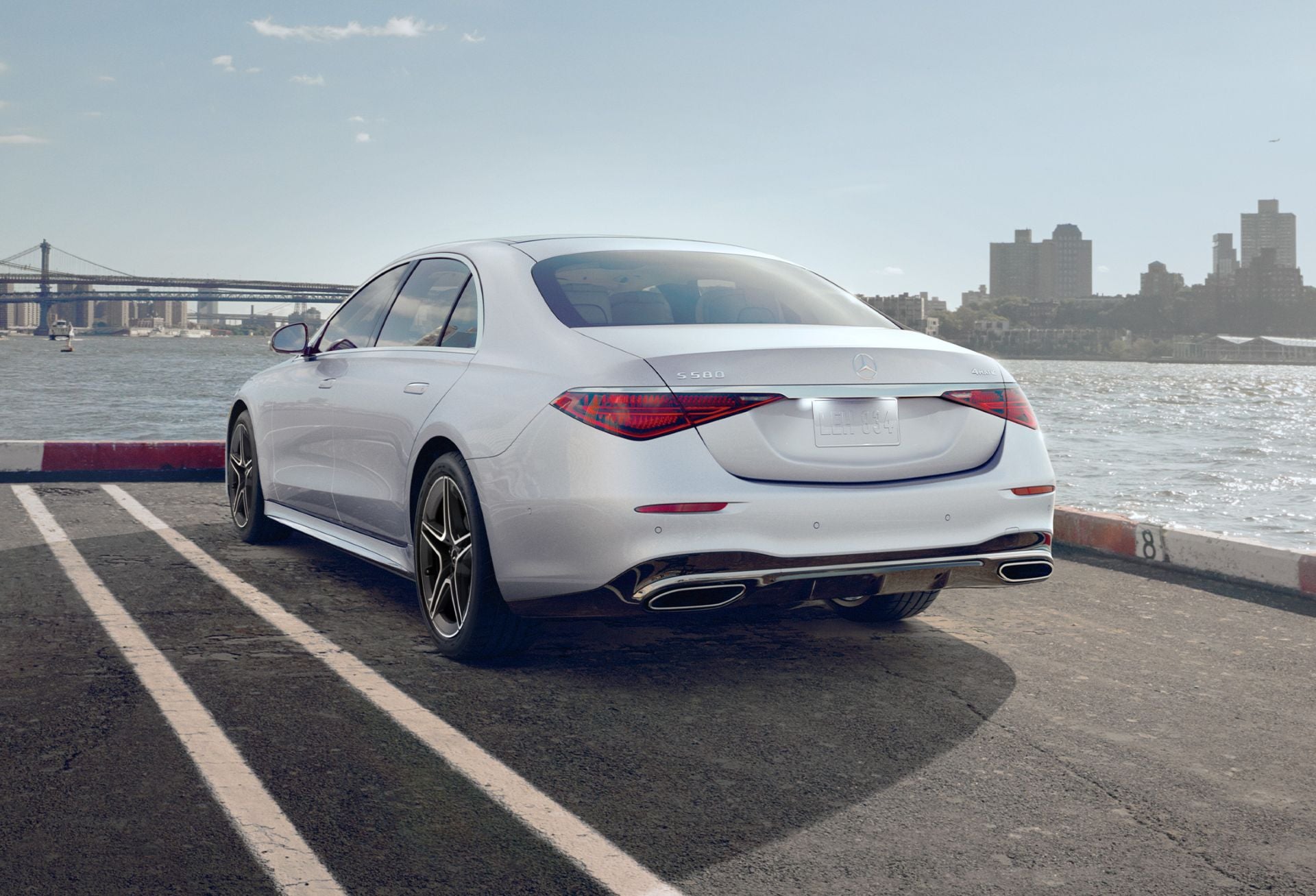 Mercedes-Benz S-Class Sedan parked in front of a modern building